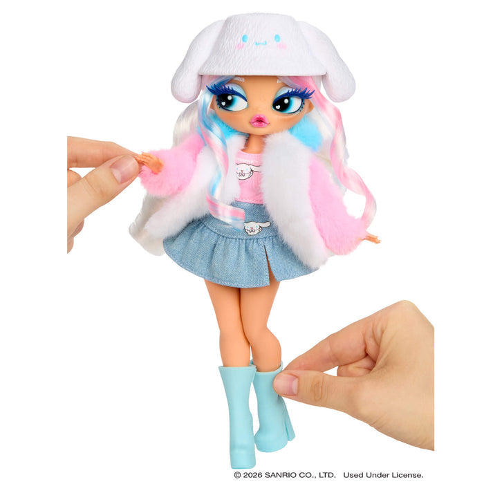 Toy doll with pink highlights and blue eyes, wearing a white hat and denim skirt, held by a hand on a white background.