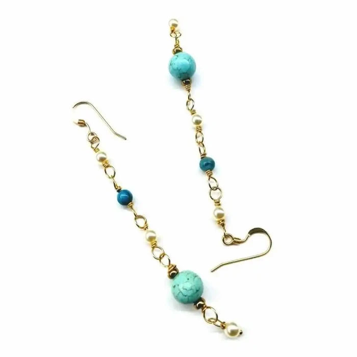 Long 14 K Gold Filled Turquoise Pearl Earrings featuring turquoise and pearl detailing on gold wire.