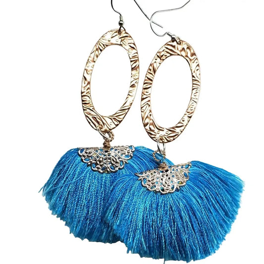 Long Copper Embossed Aqua Brushed Silk Fan Tassel Earrings showcasing vibrant aqua tassels and intricate metalwork.
