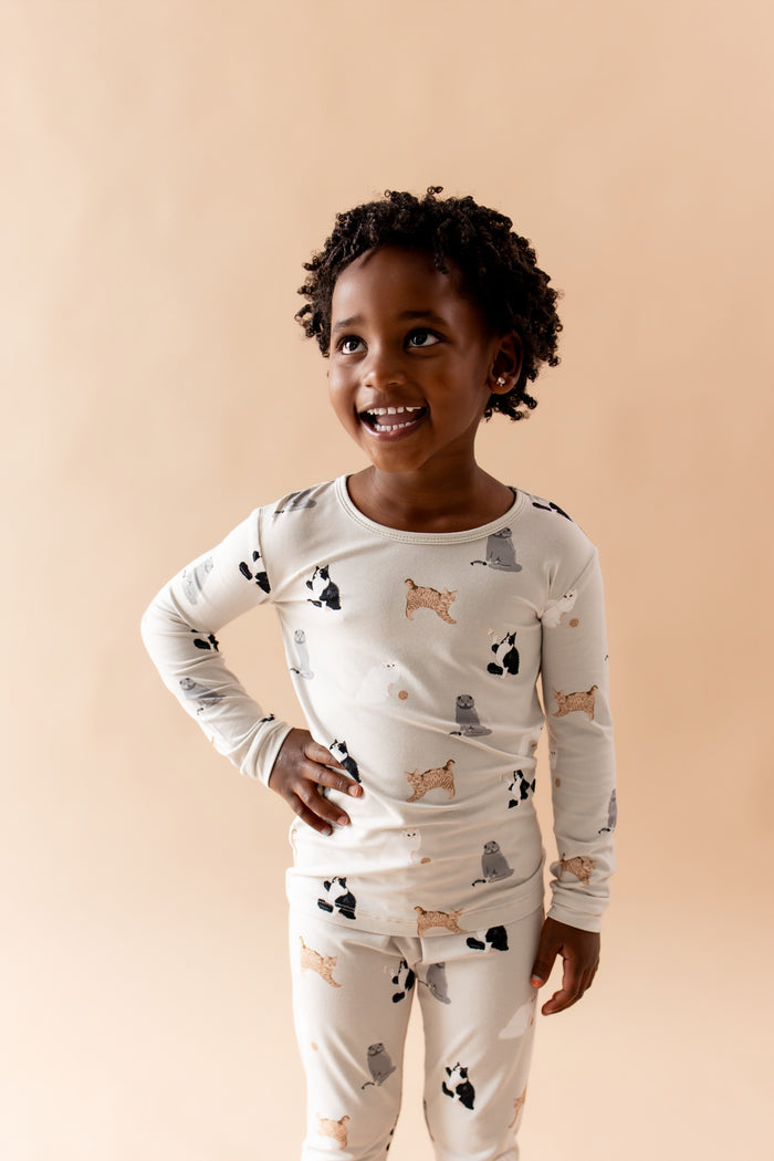 Close up of young girl wearing the Long Sleeve Pajamas in Fluffy Cat