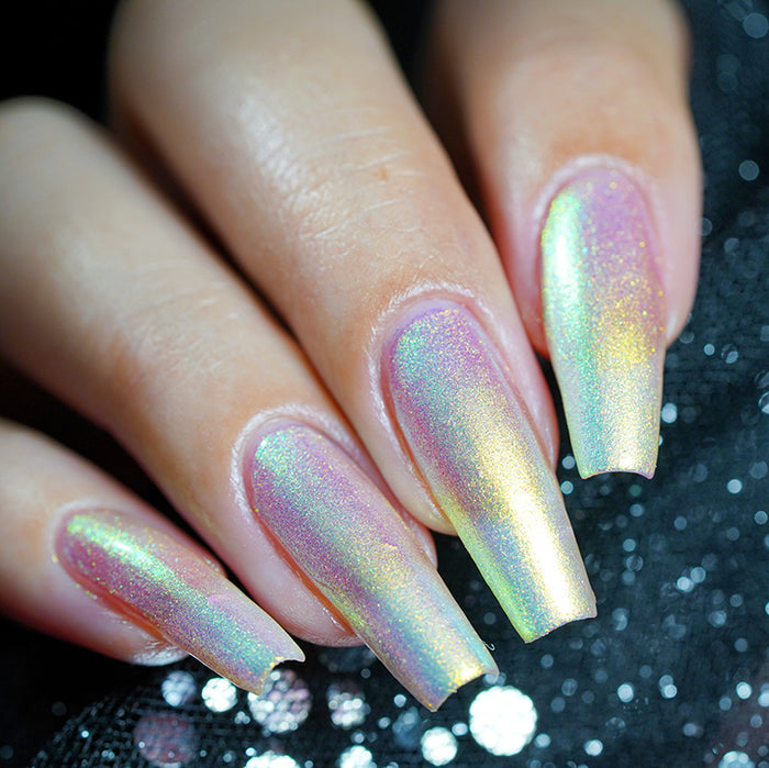 Close up shot of long nails done with Lux Nail Lacquer on fair skin tone.