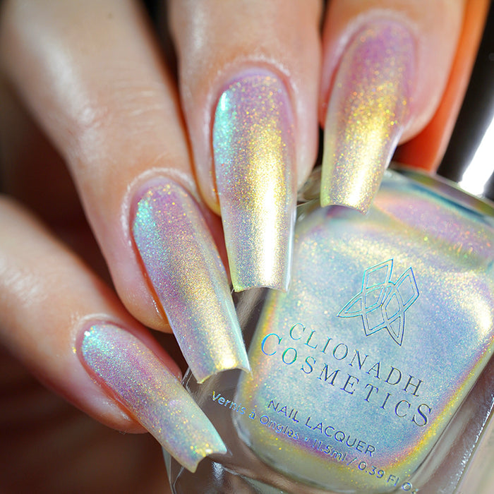 Low angled shot of long nails done with Lux Nail Lacquer on fair skin tone.