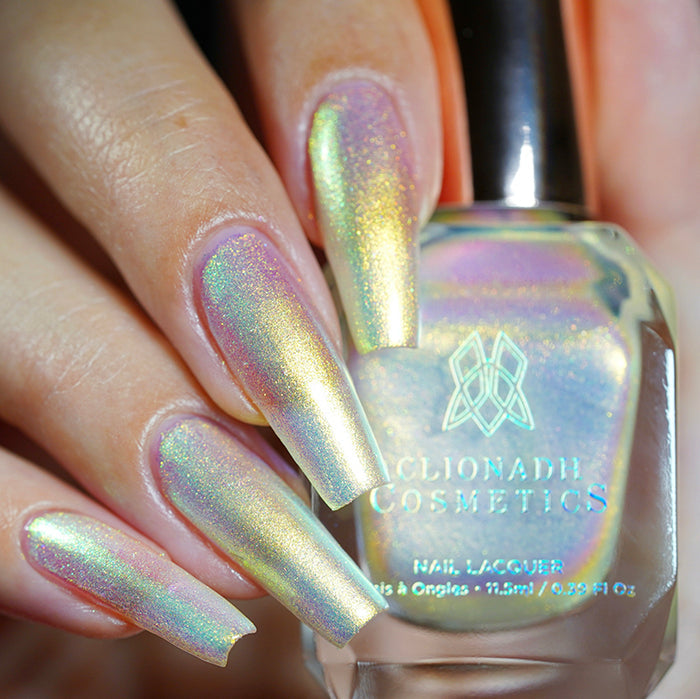 Close up shot of long nails done with Lux Nail Lacquer on fair skin tone.