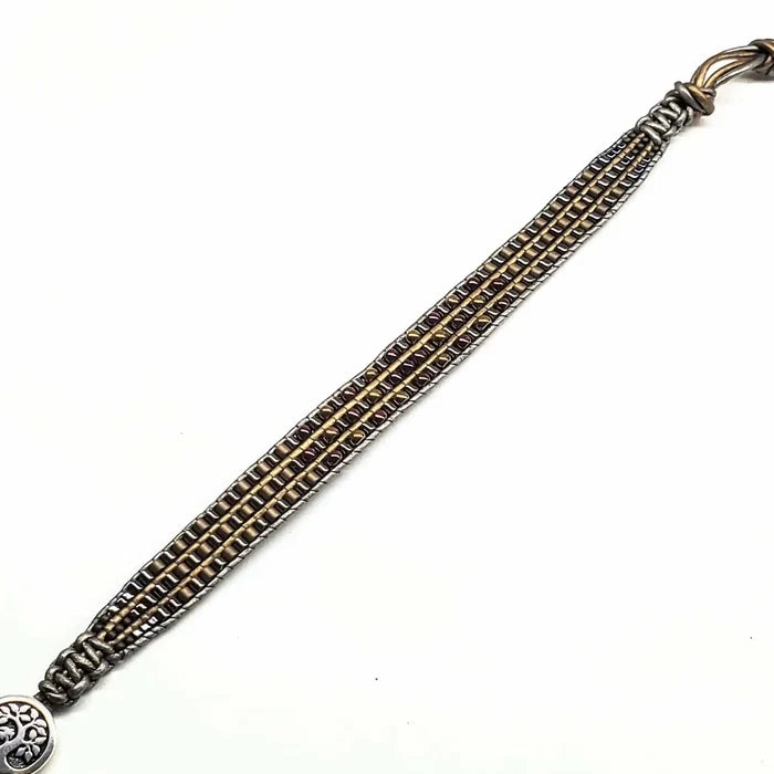 Men's Intricately Beaded Leather Tree of Life Bracelet showcasing detailed beading and craftsmanship.