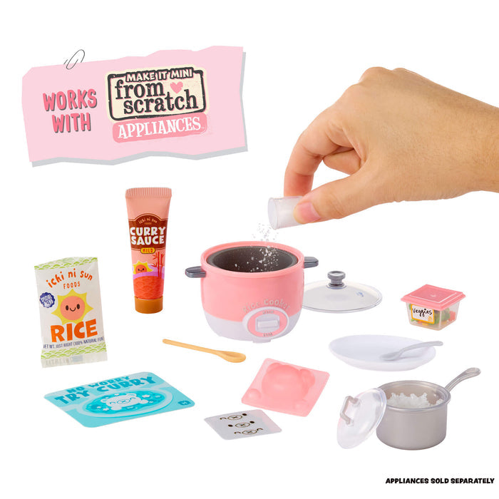 Miniature kitchen set with pink rice cooker, ingredients, and a hand adding salt.