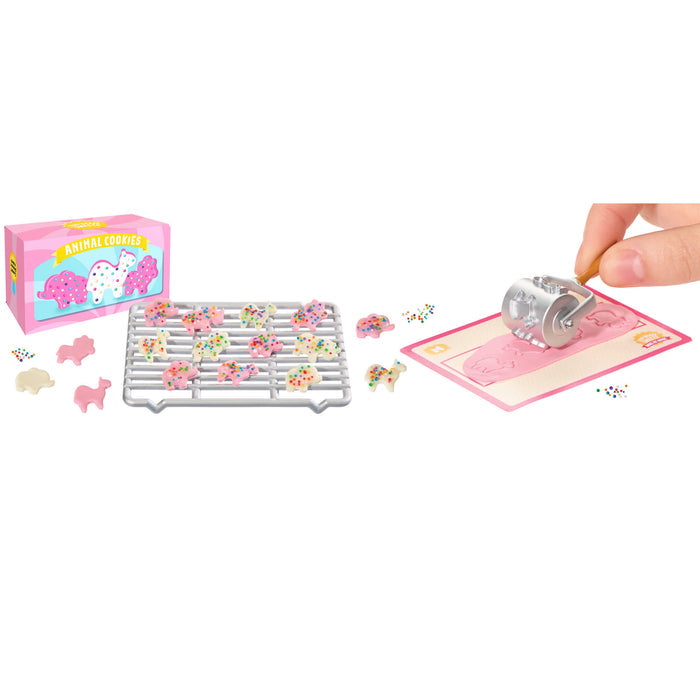 Children's animal cookies with molded roller, and decorative elements on a white background
