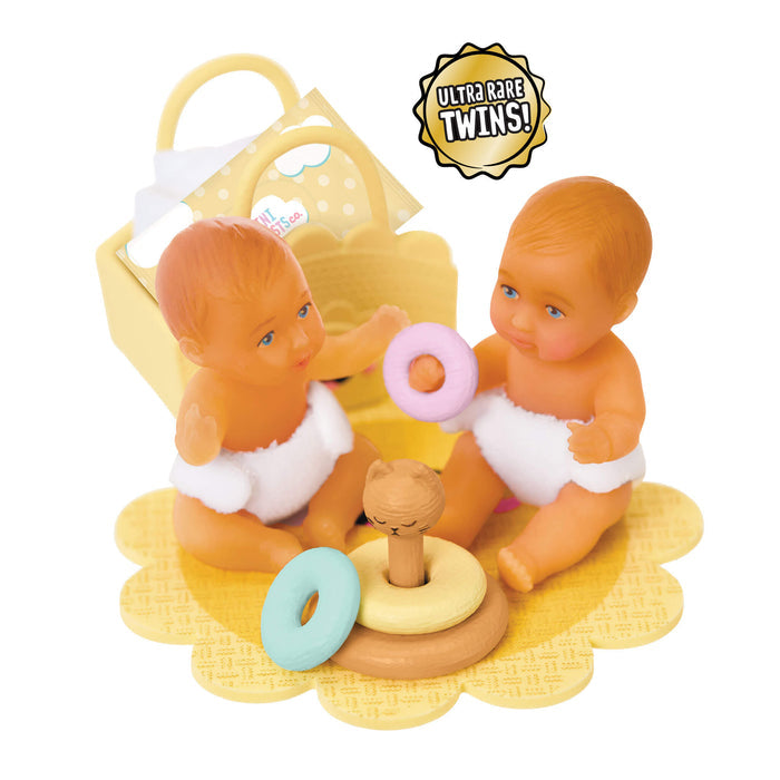 Two mini babies with text 'Ultra Rare Twins" on a white background