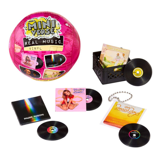 Collection of mini vinyl records and packaging on a white background