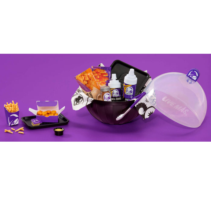 Taco Bell promotional set with bowl, bottles, and snacks on a purple background