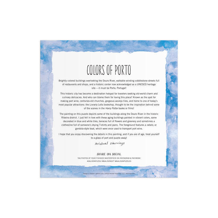 A square card with a blue watercolor border includes the title “Michael Storrings Colors of Porto 500 Piece Puzzle” by Michael Storrings, inspiration text about the Porto-themed art, social sharing info, and the artist’s signature at the bottom.