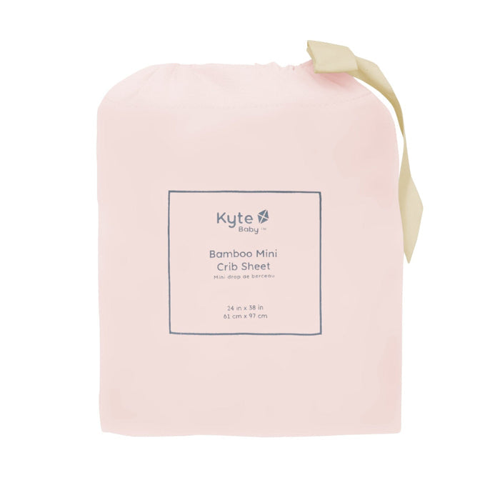 Kyte Baby Bamboo Mini Crib sheet in Blush Pink inside bag