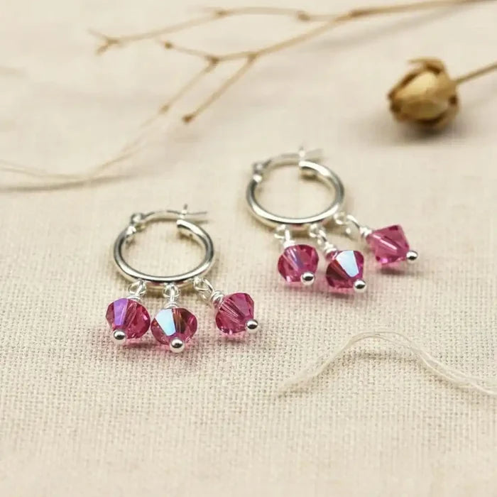 Mini Sterling Silver Hoop Pink Crystal Dangle Earrings with vibrant pink crystals and silver hoops.