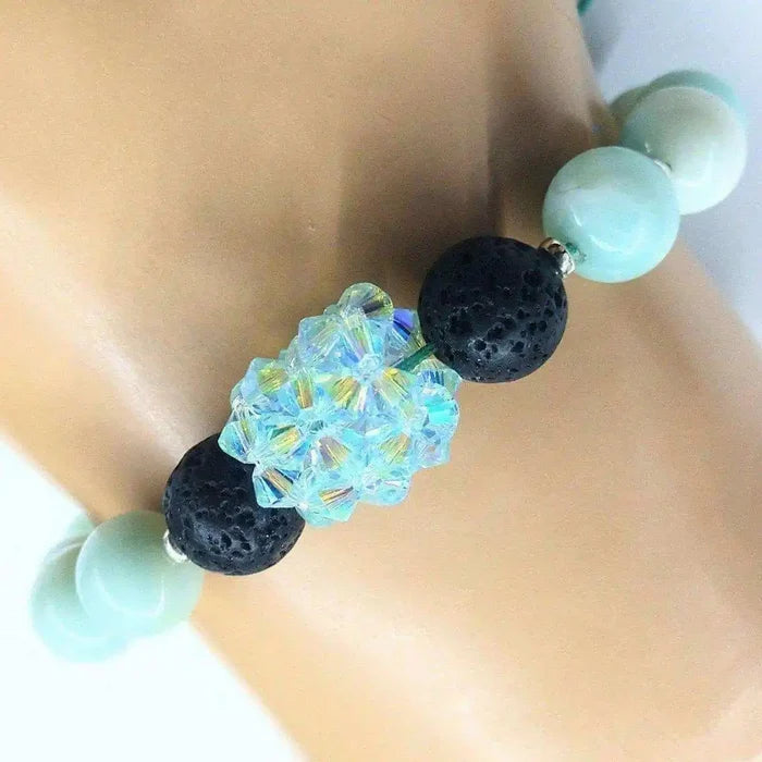 Mint Green Amazonite Gemstone Crystal Lava Rock Bracelet displayed on a wrist, showcasing its vibrant colors and unique design.