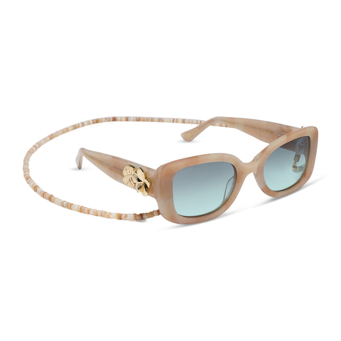diff eyewear x disney princess featuring the moana square sunglasses with a beige tortoise acetate frame and seafoam green lenses angled view