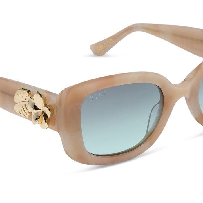diff eyewear x disney princess featuring the moana square sunglasses with a beige tortoise acetate frame and seafoam green lenses detailed view