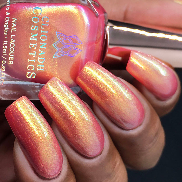Bottom angled shot of nails done with Monarch Nail Lacquer on medium skin tone