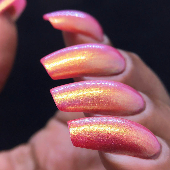 Right angled shot of nails done with Monarch Nail Lacquer on medium skin tone