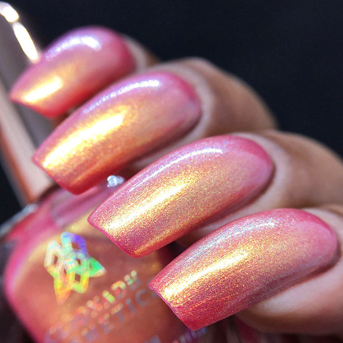Right angled shot of nails done with Monarch Nail Lacquer on medium skin tone