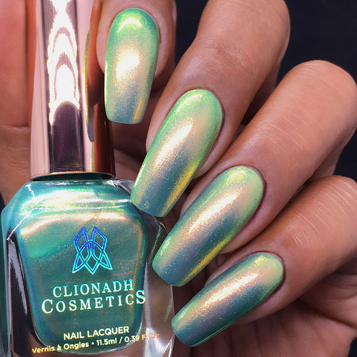Close up shot of nails done with Mural Nail Lacquer on medium skin tone