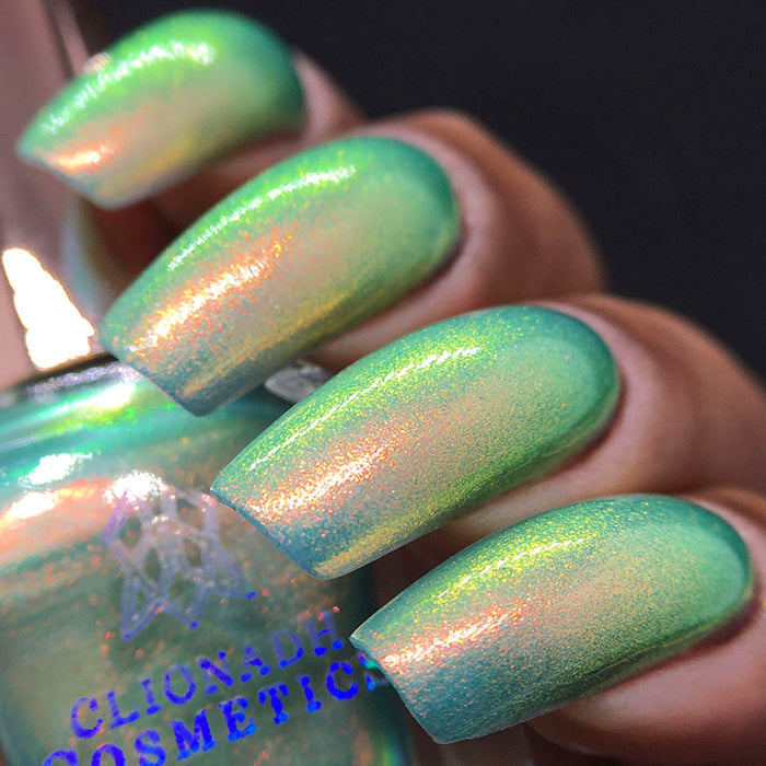 Right angled shot of nails done with Mural Nail Lacqer on medium skin tone