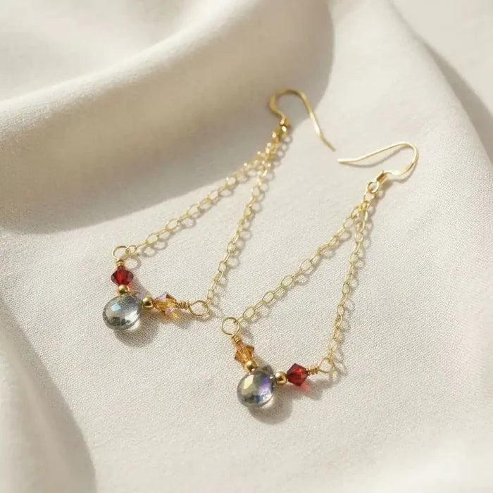 Mystic Rainbow Quartz Drop Gold Filled Earrings featuring iridescent gemstones and gold-filled components.