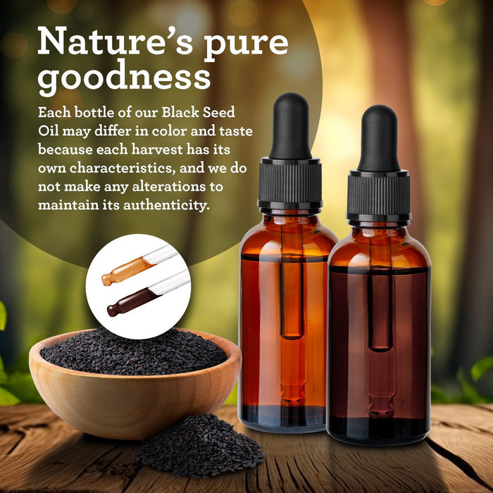GuruNanda Black Seed Oil bottles showing natural color variation from unaltered cold-pressed cumin seed harvests