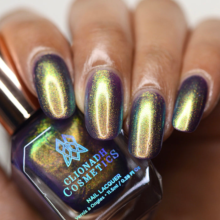 Close up of nails done with Niello nail lacquer on medium skin tone.