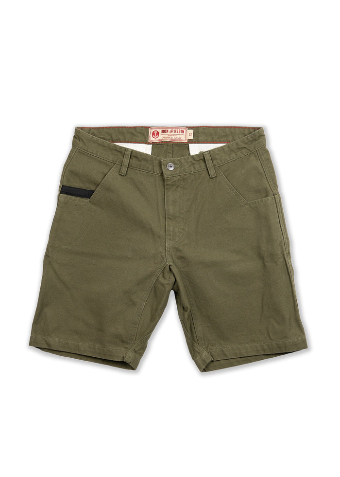 Green Iron & Resin shorts with front pockets and a black accent on the left. Button closure and belt loops are visible.