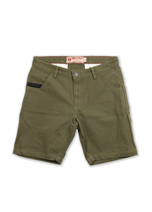 Green Iron & Resin shorts with front pockets and a black accent on the left. Button closure and belt loops are visible.