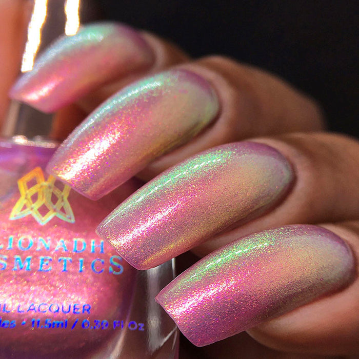 Right angled shot of nails done with Palace Nail Lacquer on medium skin tone