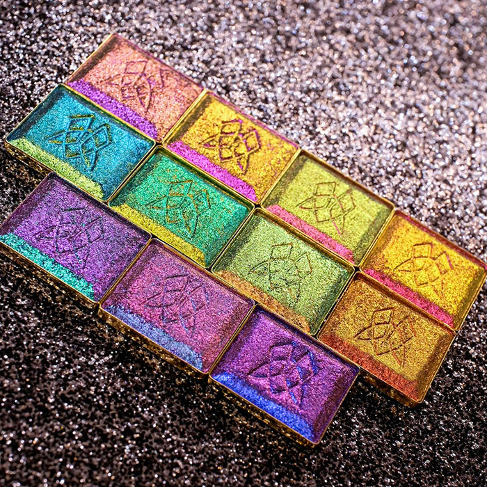 Flat lay of Patina Lite as well as the other Jewelled Lites on a black sparkly background.
