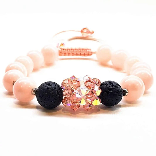 Peach Corral Jade Gemstone Crystal Lava Rock Bracelet featuring Maui lava rock beads and sparkling accents.