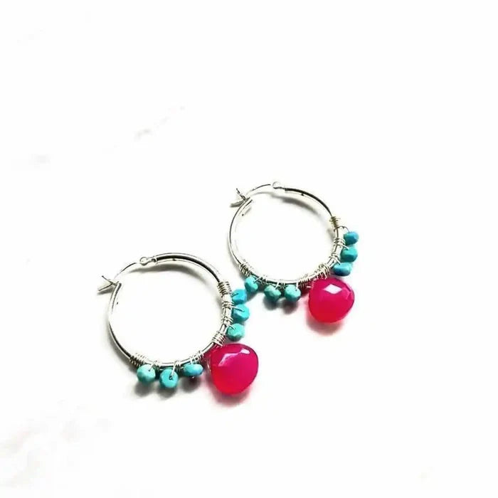 Pink and Sleeping Beauty Turquoise Silver Wire Hoop Earrings with vibrant pink and turquoise accents.