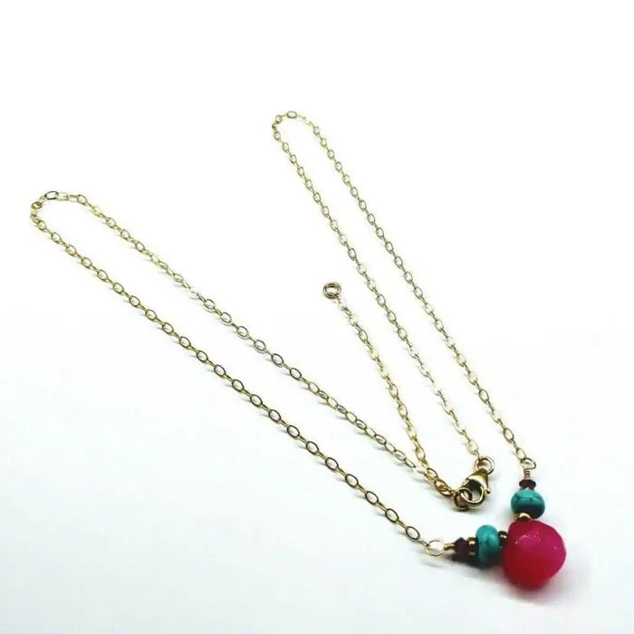 Gold Filled Turquoise and Pink Gemstone Drop Necklace featuring pink chalcedony and turquoise on a gold chain.