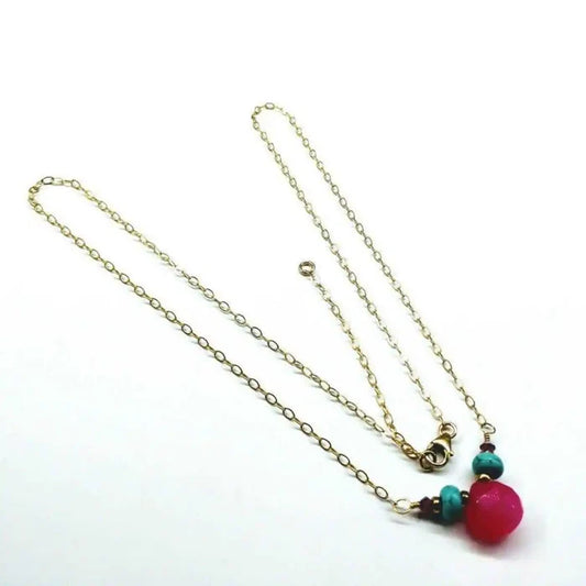 Gold Filled Turquoise and Pink Gemstone Drop Necklace featuring pink chalcedony and turquoise on a gold chain.