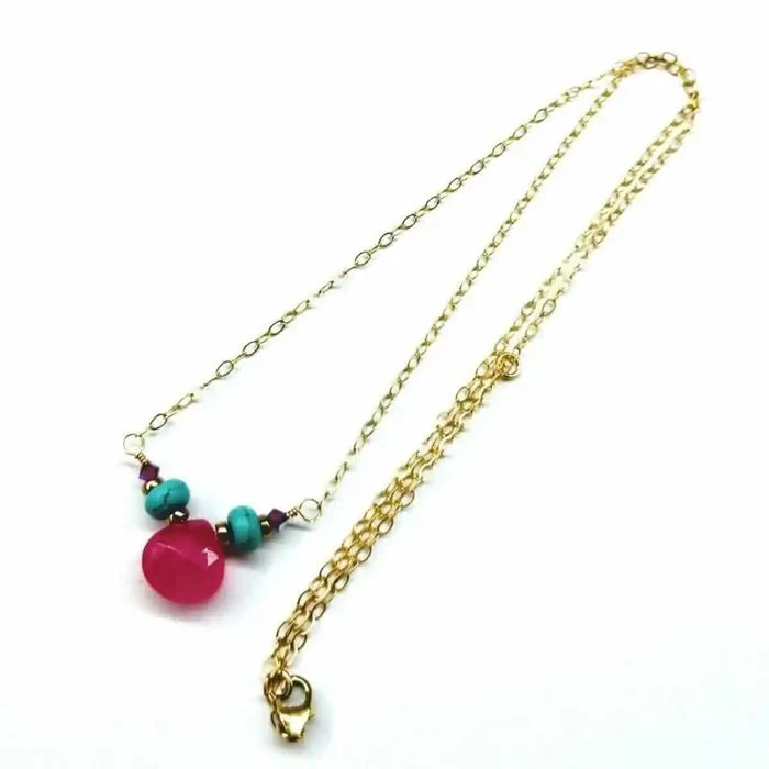 Gold Filled Turquoise and Pink Gemstone Drop Necklace featuring pink chalcedony and turquoise beads on a gold chain.