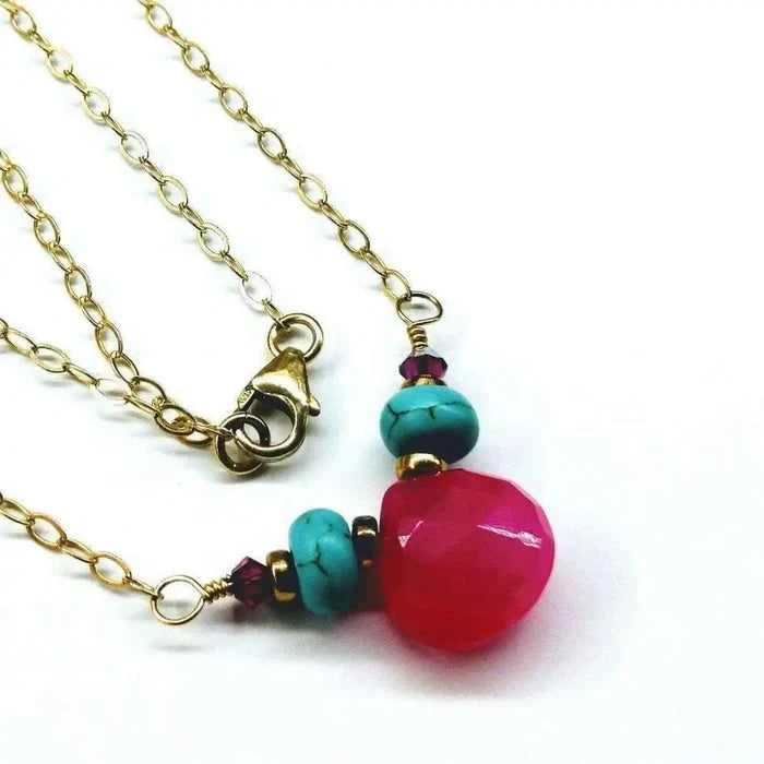 Gold Filled Turquoise and Pink Gemstone Drop Necklace featuring hot pink chalcedony and turquoise beads on a gold chain.