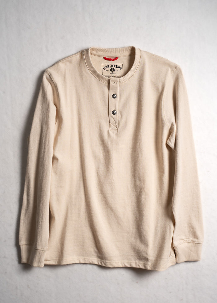 Cream long-sleeve henley shirt with three buttons, featuring a visible Iron & Resin label, displayed against a light background.