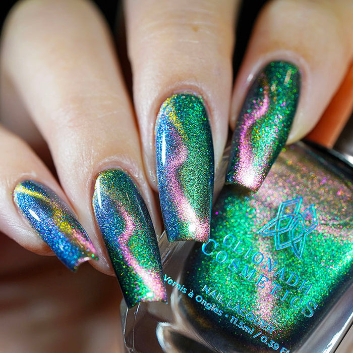 Close up shot of nails done with Psilocybin Nail Lacquer featuring a design showing off the magnetic effect on fair skin tone