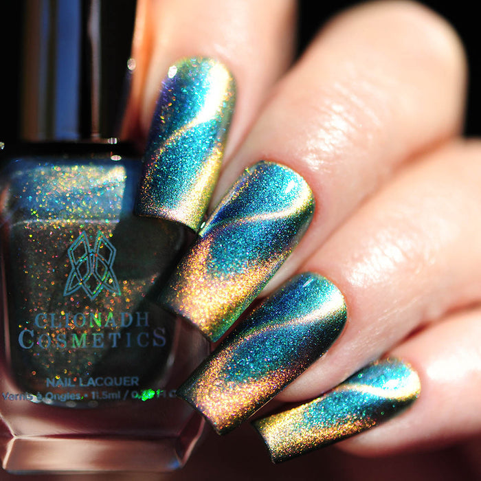 Close up shot of long nails done with Psilocybin Nail Lacquer on fair skin tone.