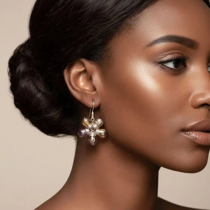 Purple and Yellow Flower Sterling Silver Earrings worn by a model, showcasing nature-inspired jewelry elegance.