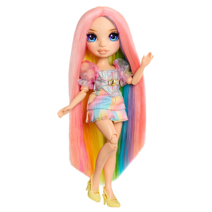 Doll with long, colorful hair and a rainbow-themed outfit on a white background