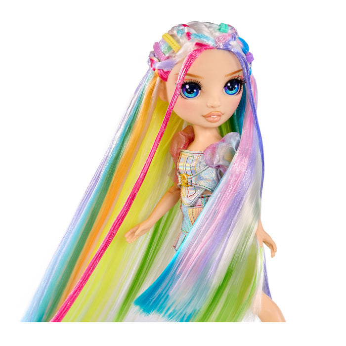 Doll with colorful hair and a dress on a white background