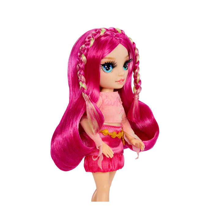 Doll with pink hair on a white background