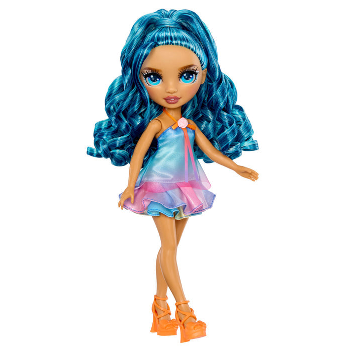 Doll with blue hair, blue and pink dress and orange high heels on a white background