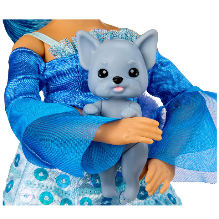 Toy figure holding a small gray dog against a blue fabric background
