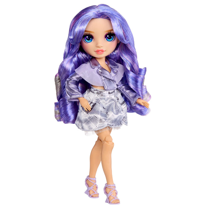 Doll with purple hair and outfit on a white background