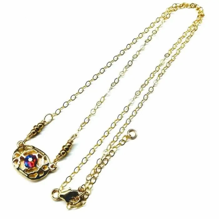 Red Crystal 14 K Gold Filled Adjustable Filigree Choker with shimmering red Swarovski crystal.