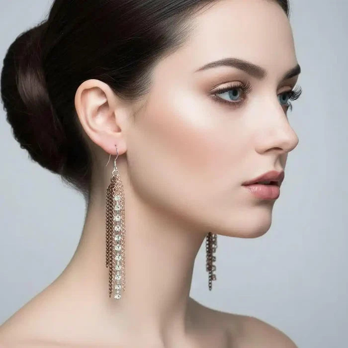 Rhinestone Crystal Chain Fringe Earrings worn by a model, showcasing shimmering fringe and elegant design.
