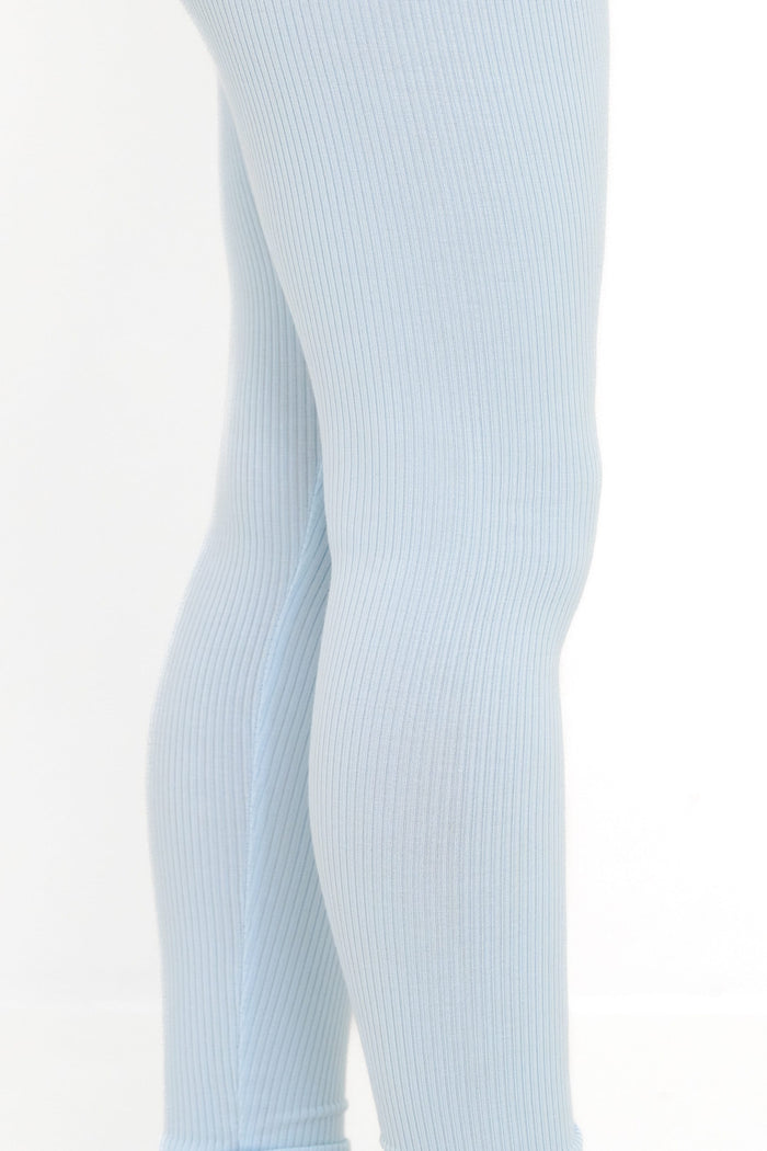 Close up of the ribbed fabric of the Ribbed Leggings in Breeze shown on a young girl model